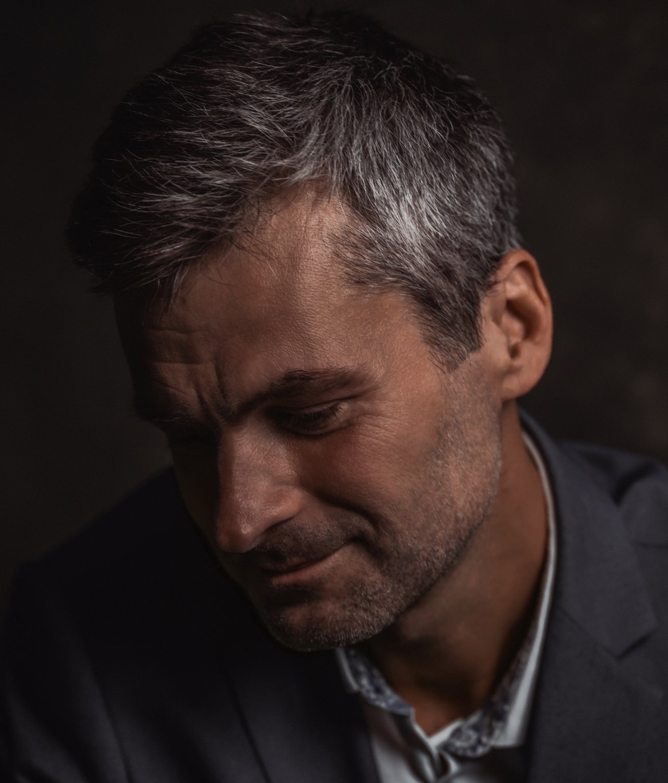 Man in a tailored suit — portrait series cover